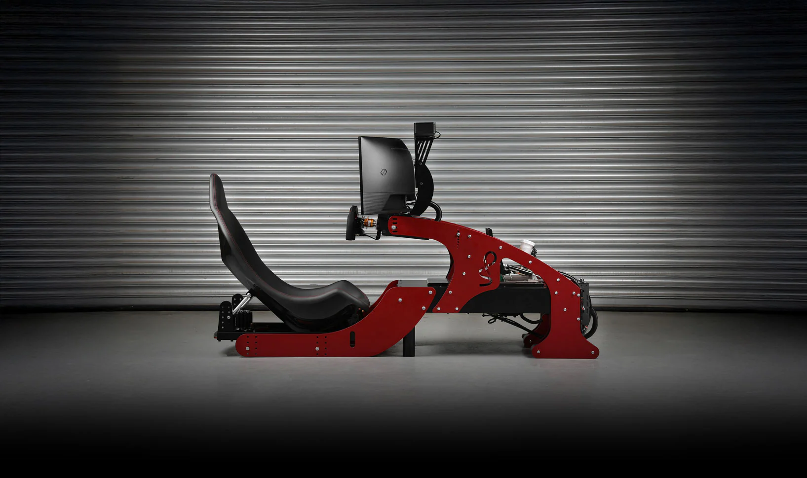 Racing simulator on track background